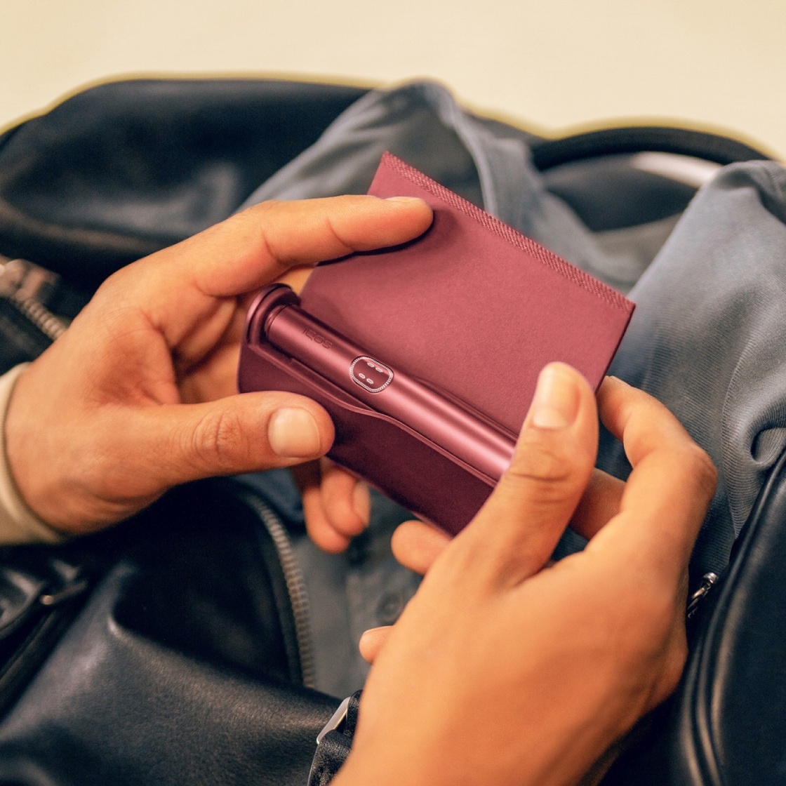 Man unboxing a new IQOS 3 DUO